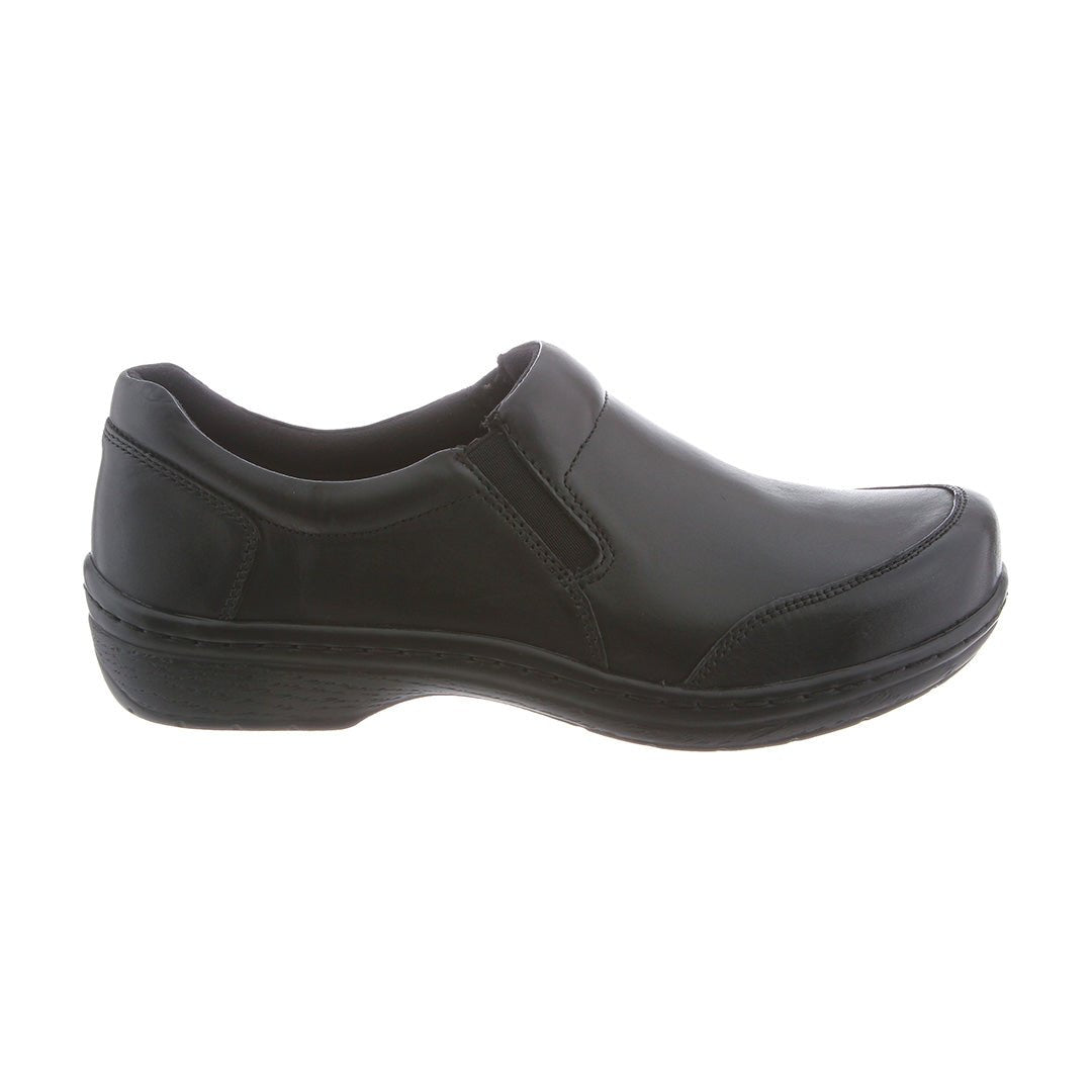 Outside view of Arbor men's shoes, featuring the durable leather upper and closed heel design, offering both style and a secure fit for long hours of wear.