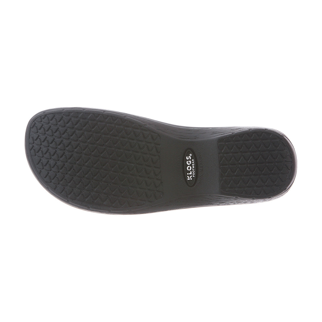 Close-up of the outsole of Arbor men's shoes, showcasing the durable tread for superior traction, ensuring comfort and stability throughout long workdays.